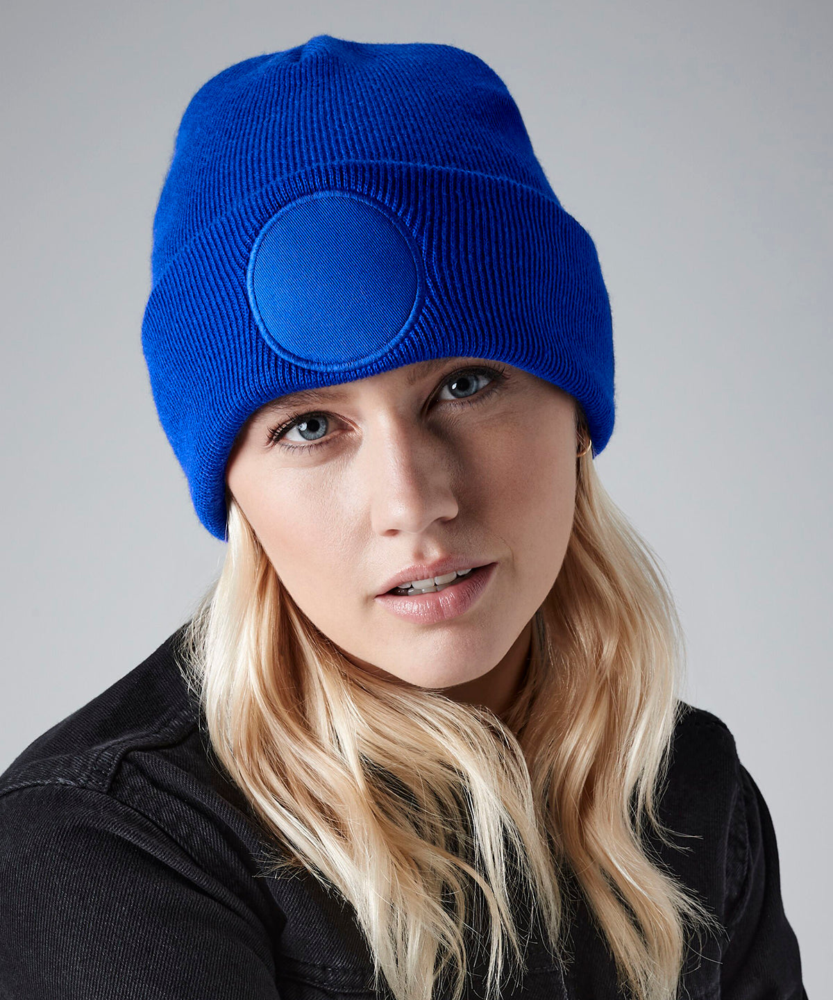 White circular patch beanie front view