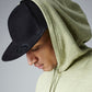 Black pro-stretch flat peak cap front view