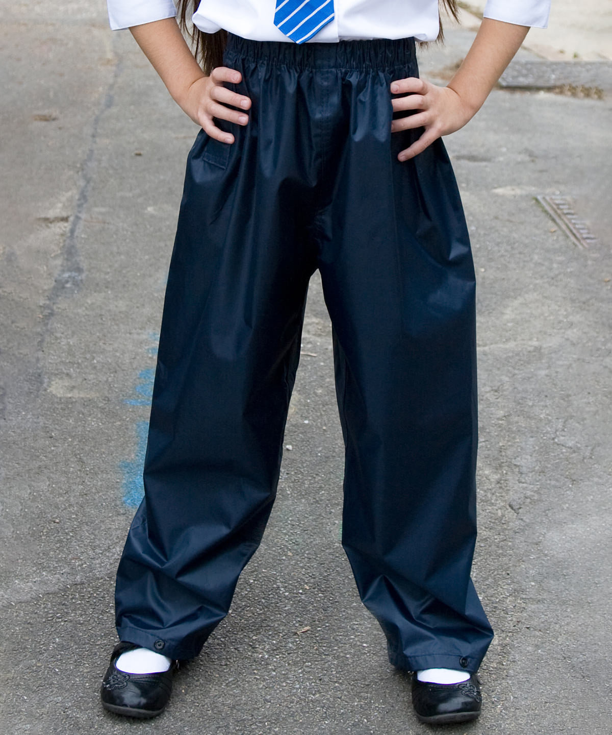 Navy core junior rain trousers front view